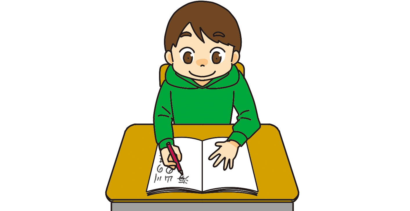 ノートに漢字を書く子ども