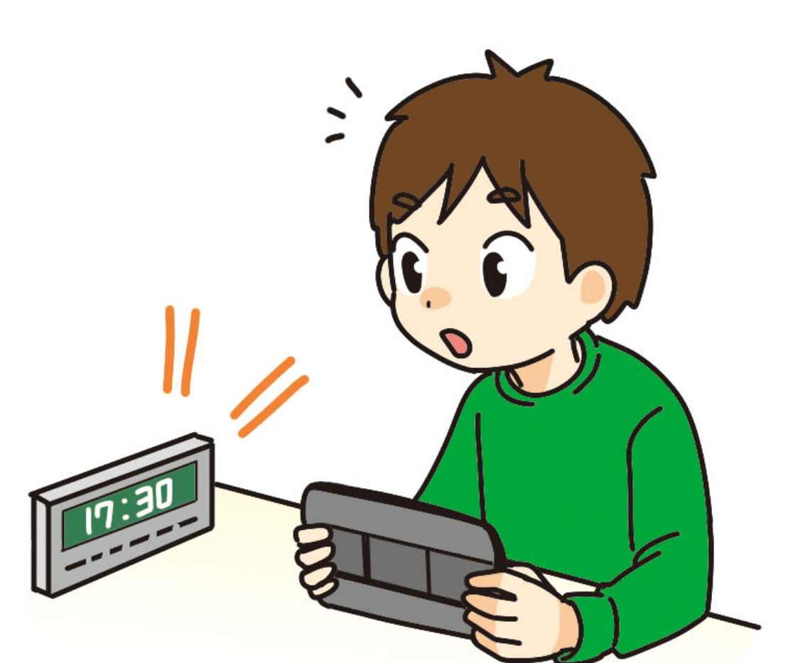 17時30分にアラームが鳴り、ゲームをしていた手を止める子ども