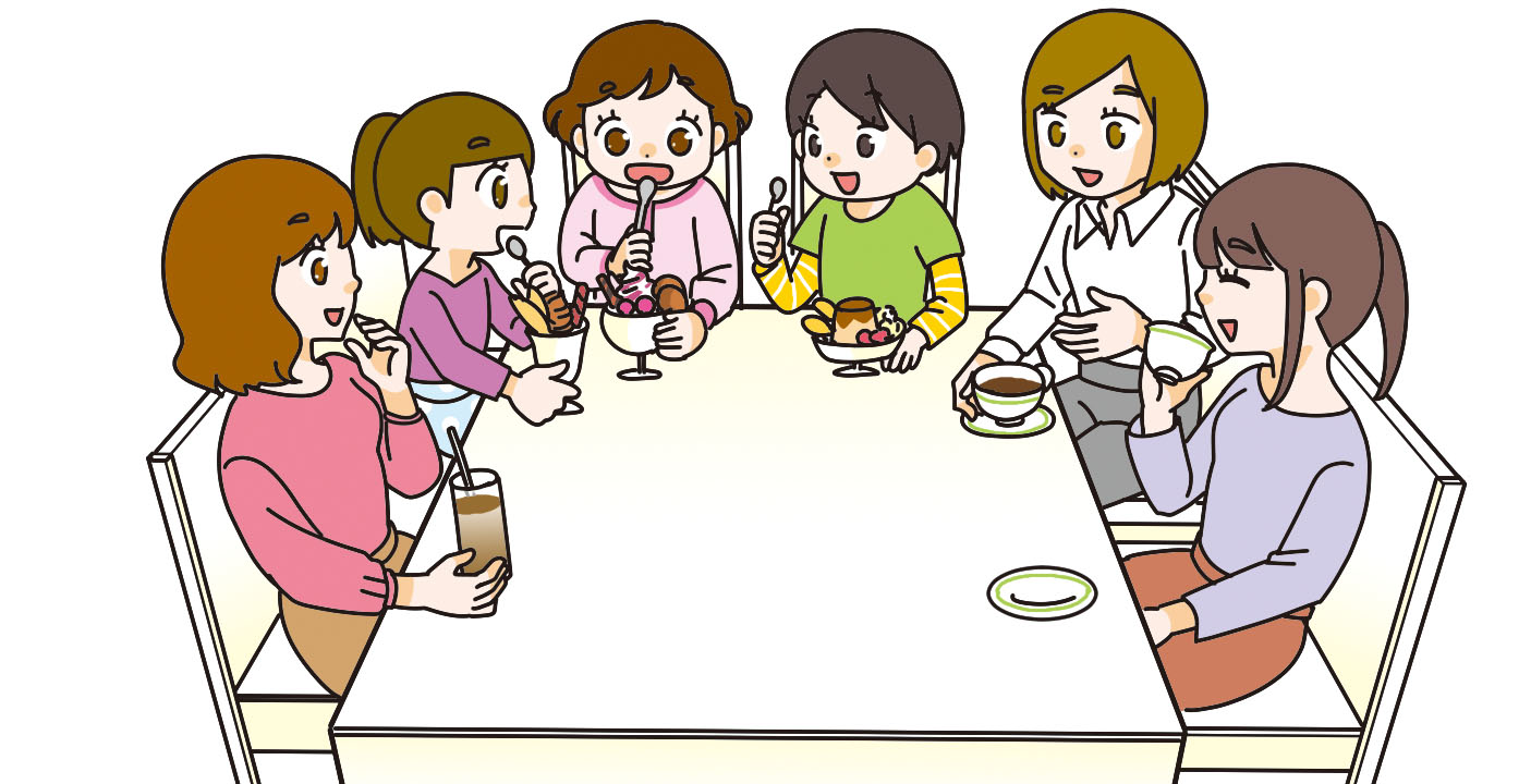 保護者と子供が甘いものを食べながら楽しそうに会話をする