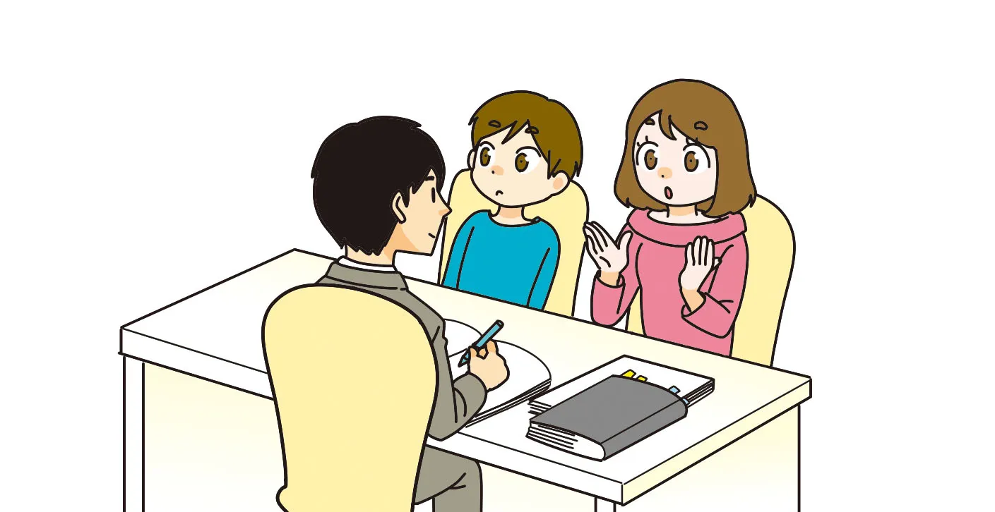 専門家に自分の子供について相談する親